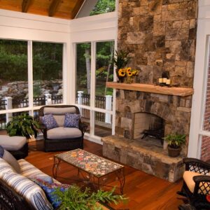 fireplace and furniture in porch